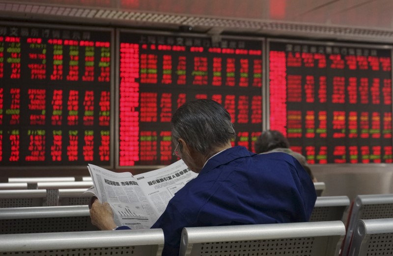 © Reuters. China fusionará medios estatales para tener más voz en noticias financieras