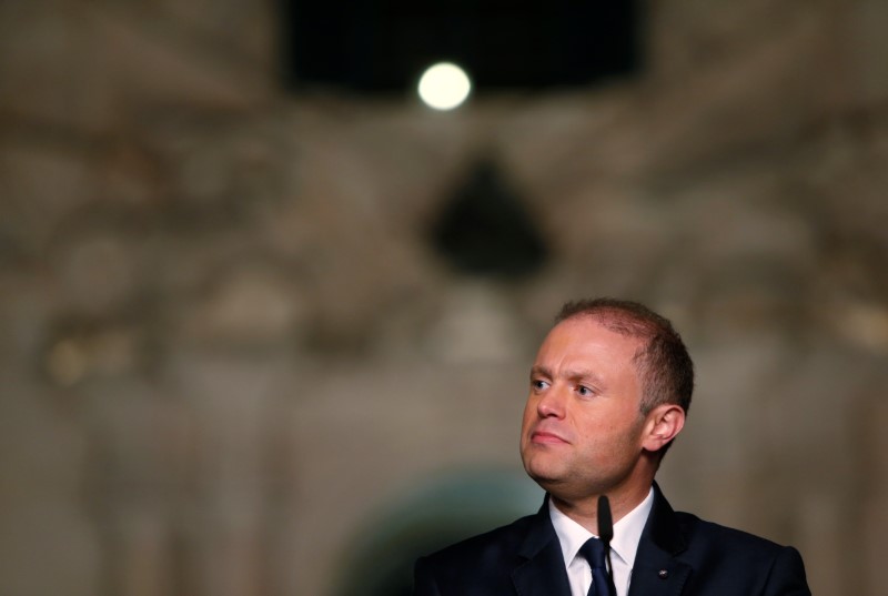 © Reuters. Malta's Prime Minister Joseph Muscat addresses a news conference outside his office at Auberge de Castille after the presentation of the 2017 Budget speech in Valletta