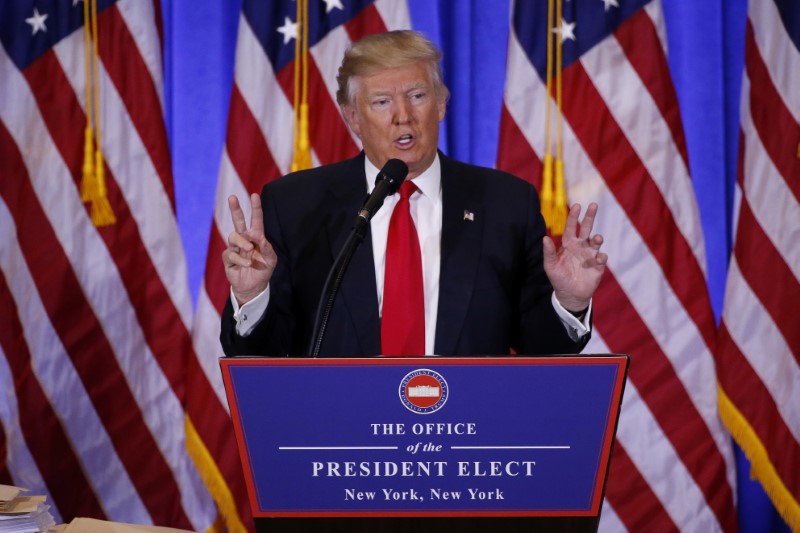 © Reuters. U.S. President-elect Donald Trump speaks during a news conference in the lobby of Trump Tower in Manhattan, New York City