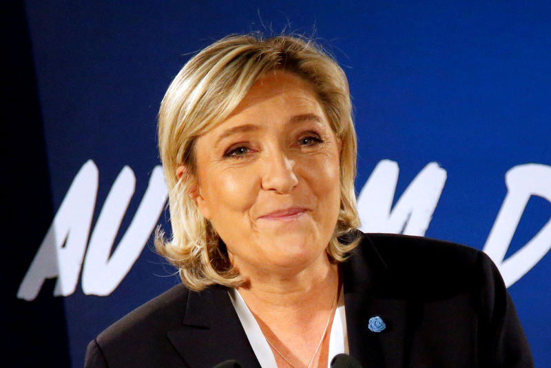 © Reuters. FILE PHOTO:  Marine Le Pen, French far-right National Front (FN) party president, member of European Parliament and candidate in the French 2017 presidential election, speaks to the media in Paris