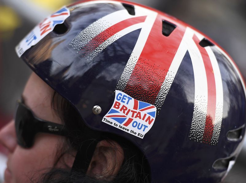© Reuters. File photo of a cyclist wearing a pro-Brexit badge on her Union flag themed helmet outside the Supreme Court in Parliament Square, central London