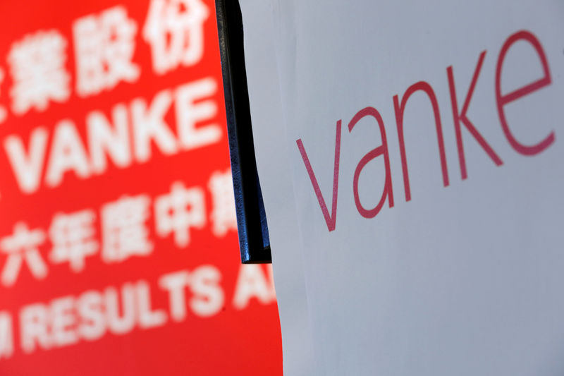 © Reuters. FILE PHOTO -  A sign of China Vanke is seen in Hong Kong