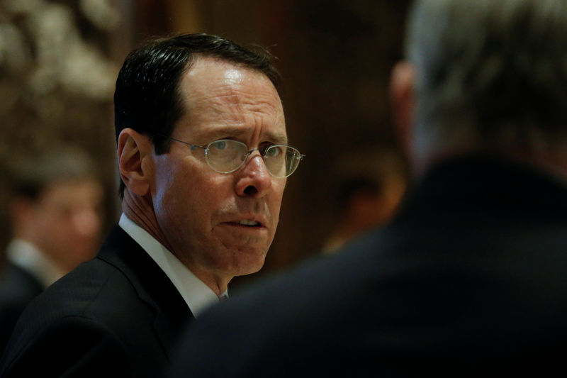 © Reuters. Randall Stephenson, Chief Executive Officer (CEO) of AT&T arrives for meeting with U.S. President-elect Donald Trump at Trump Tower in New York