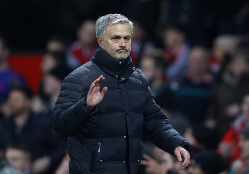 © Reuters. Manchester United manager Jose Mourinho waves to fans after the game