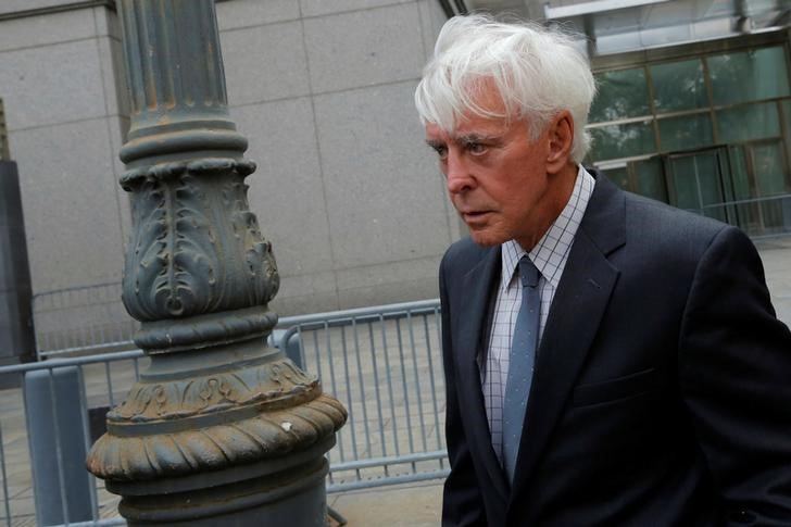 © Reuters. Professional sports gambler William "Billy" Walters departs Federal Court after a hearing in Manhattan, New York