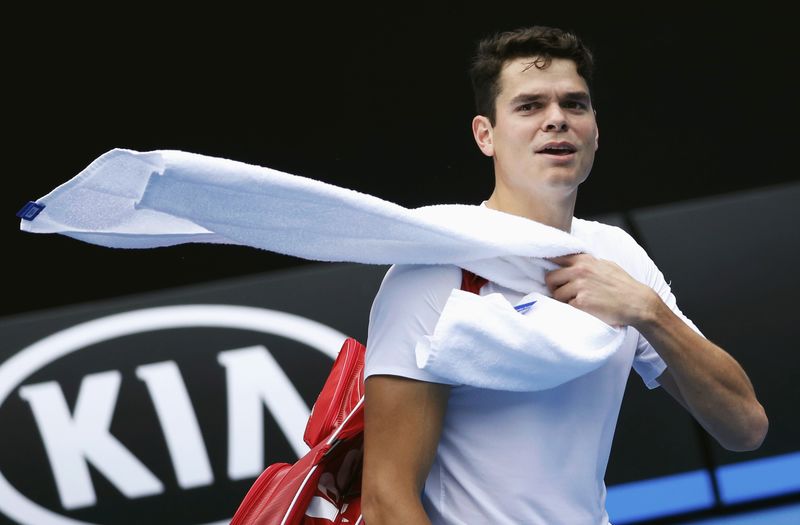 © Reuters. Canada's Milos Raonic walks after a training session ahead of the Australian Open tennis tournament in Melbourne