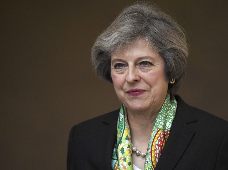 © Reuters. Britain's Prime Minister Theresa May leaves after giving a speech on mental health, in central London