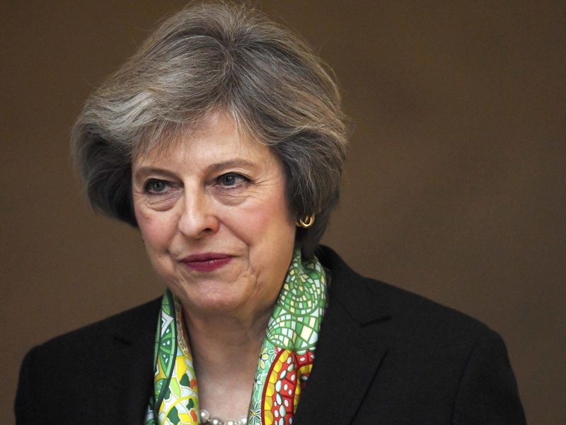 © Reuters. Britain's Prime Minister Theresa May leaves after giving a speech on mental health, in central London