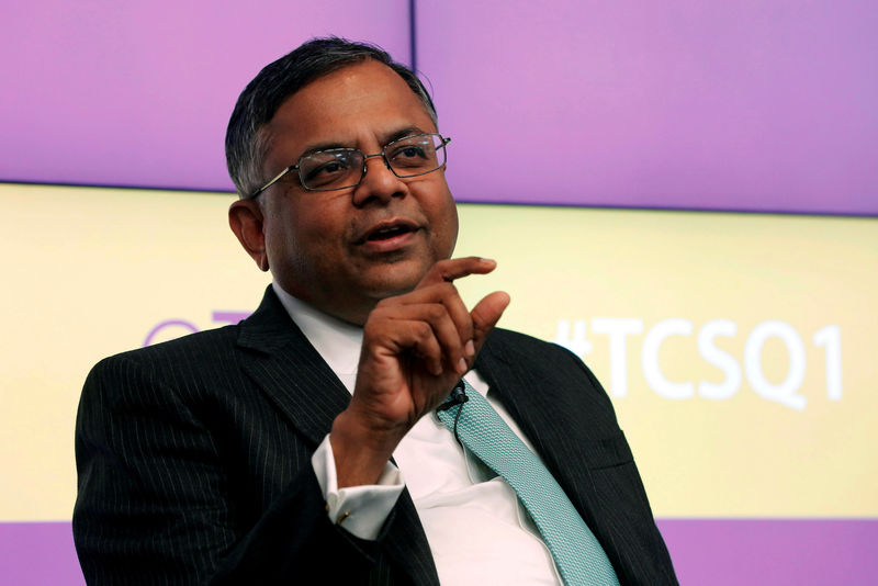 © Reuters. FILE PHOTO: TCS Chief Executive Chandrasekaran gestures as he speaks during a news conference in Mumbai