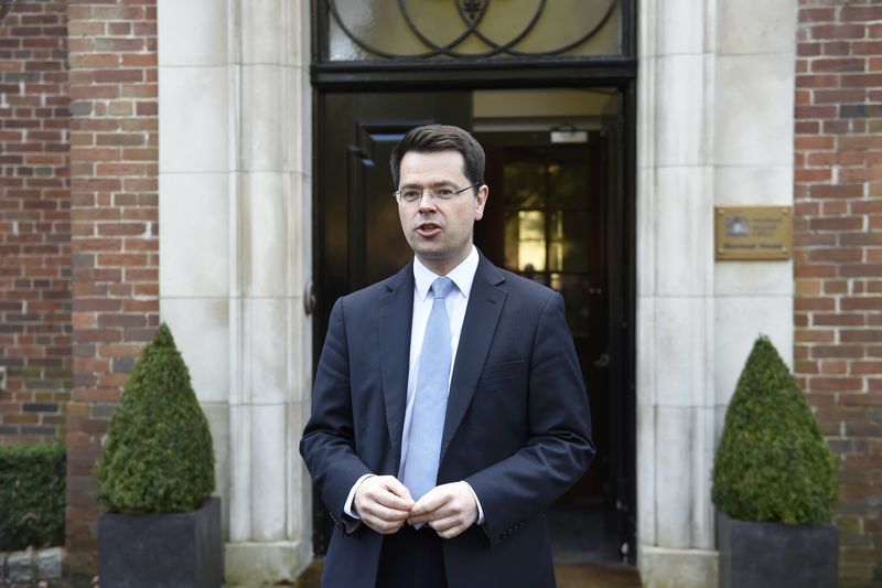 © Reuters. Britain's Secretary of State for Northern Ireland James Brokenshire speaks to media outside Stormont House in Belfast
