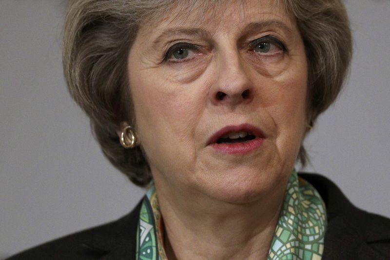 © Reuters. Britain's Prime Minister Theresa May speaks to members of the Charity Commision for England and Wales at The Royal Society in London