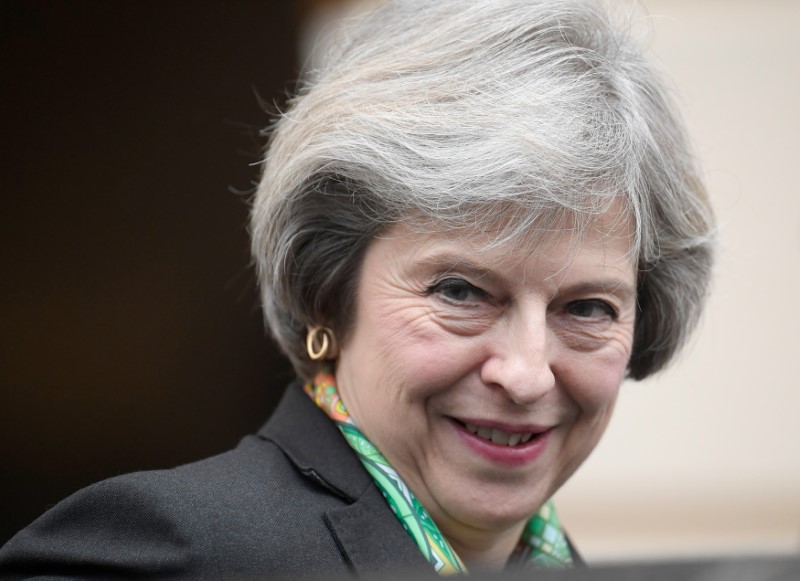 © Reuters. Britain's Prime Minister Theresa May leaves after giving a speech on mental health, in central London