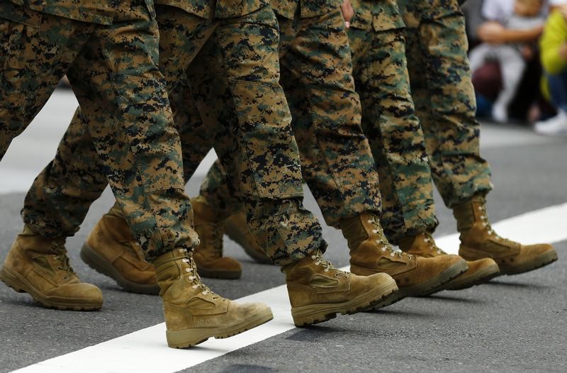 © Reuters. Sweetwater High School Marine Corp ROTC march in annual Veterans Day Parade in San Diego, California