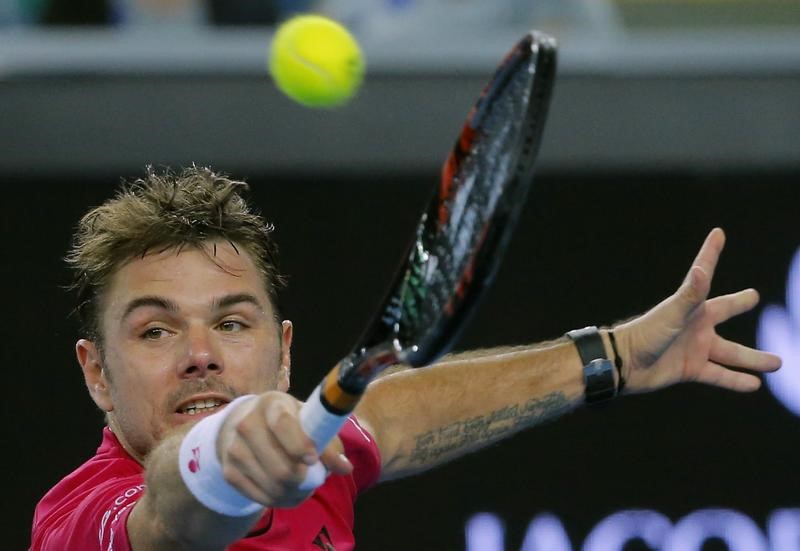 © Reuters. Murray, Federer y Wawrinka se meten en segunda ronda del Abierto de Australia
