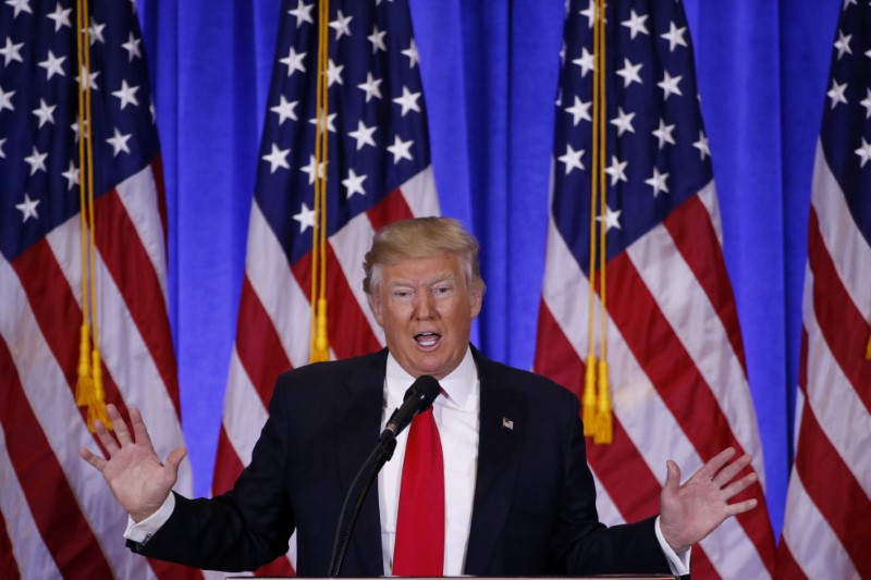 © Reuters. U.S. President-elect Donald Trump speaks during a news conference in the lobby of Trump Tower in Manhattan, New York City