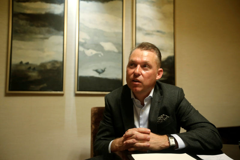 © Reuters. Andreas Schaaf, China head of General Motor's Cadillac premium brand, attends a Reuters interview in Beijing