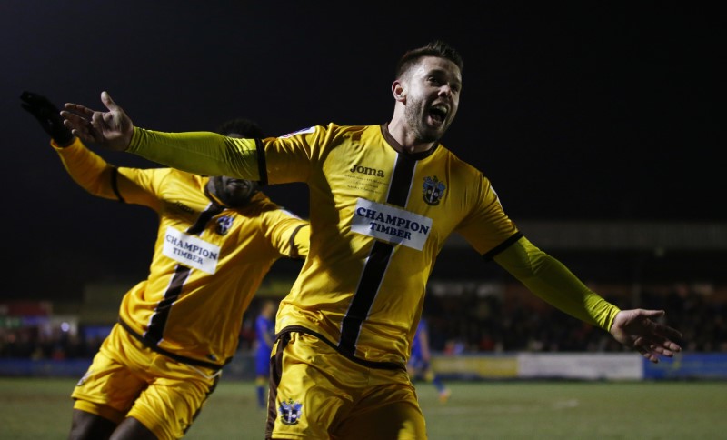 © Reuters. Sutton's Dan Fitchett celebrates scoring their third goal