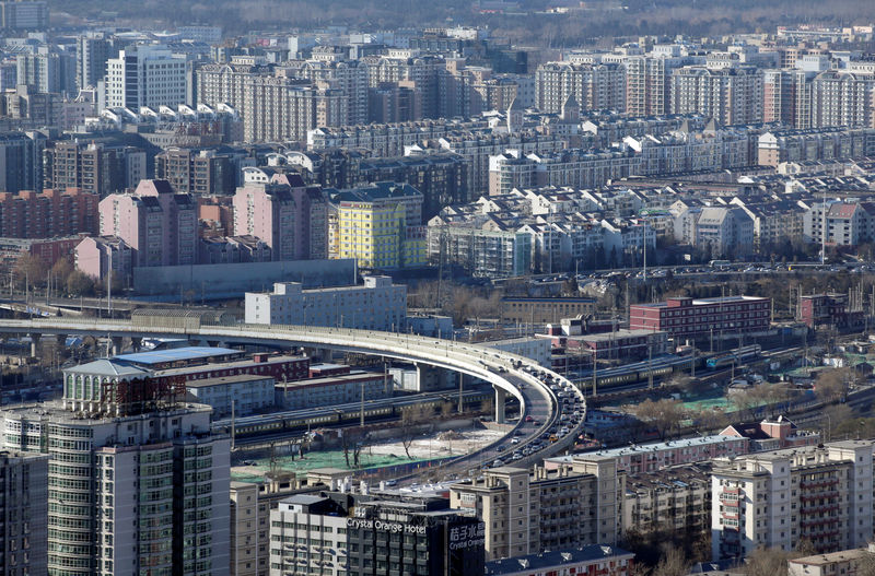 © Reuters. Residential buildings are seen in Beijing