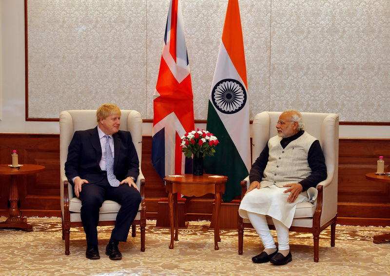 © Reuters. India's PM Modi meets British Foreign Secretary Johnson in New Delhi