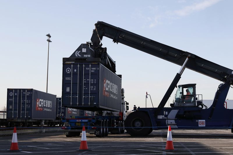 © Reuters. A truck moves a container during a welcoming ceremony to mark the inaugural trip for the first freight train to travel from China to Britain at Barking Intermodal Terminal near London