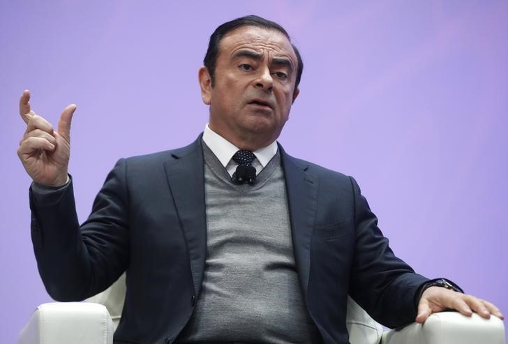 © Reuters. Chairman and CEO of Nissan Motor Corporation Ghosn speaks during the North American International Auto Show in Detroit