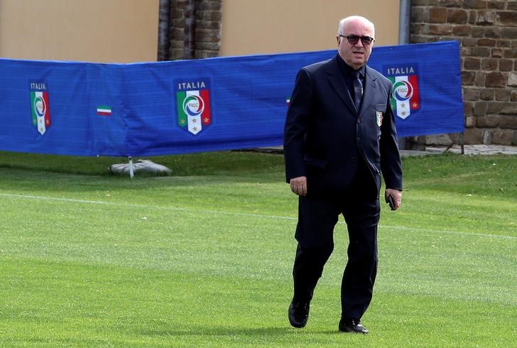 © Reuters. Italian Football Federation President Carlo Tavecchio arrives before the Italy's national soccer team official photo at the Coverciano training center