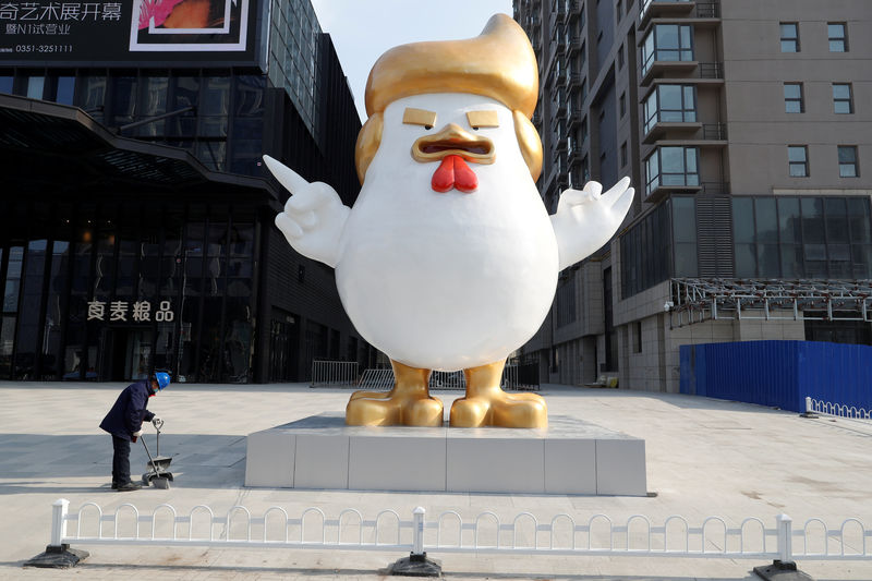 © Reuters. FILE PHOTO -  A sculpture of a rooster that local media say bears resemblance to U.S. President-elect Donald Trump is seen outside a shopping mall in Taiyuan