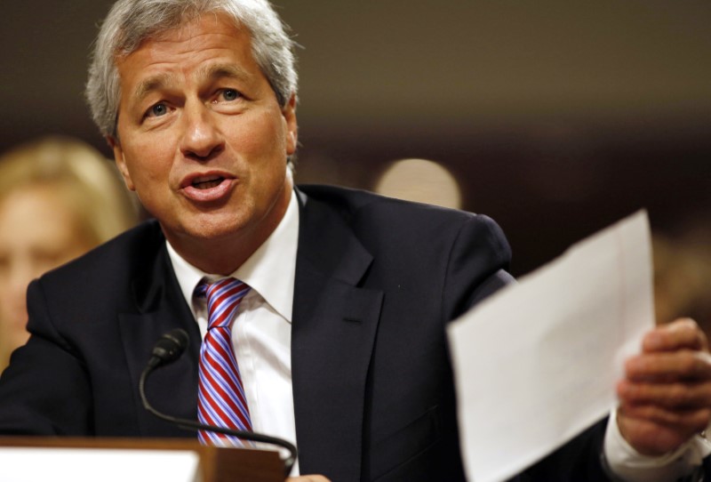 © Reuters. Jamie Dimon answers a question at the U.S. Senate Banking, Housing and Urban Affairs Committee hearing in Washington