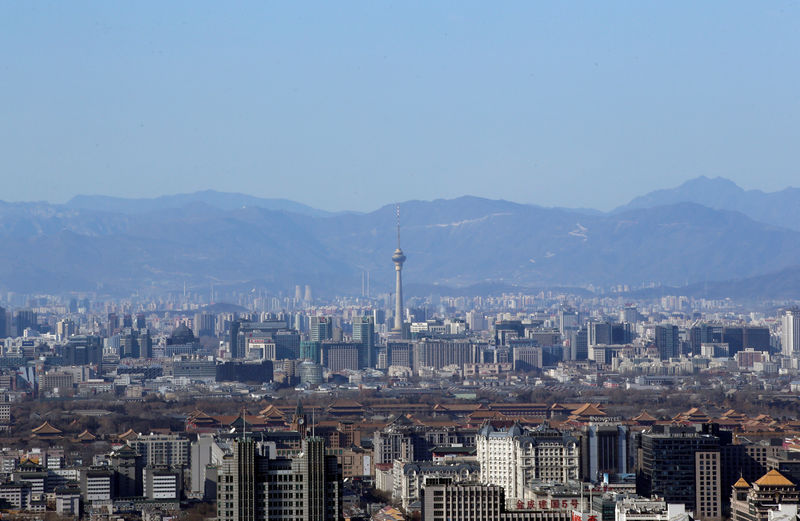 © Reuters. A general view shows Beijing's skyline on a sunny day