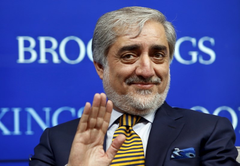 © Reuters. Afghan Chief Executive Abdullah Abdullah waves at the Brookings Institution
