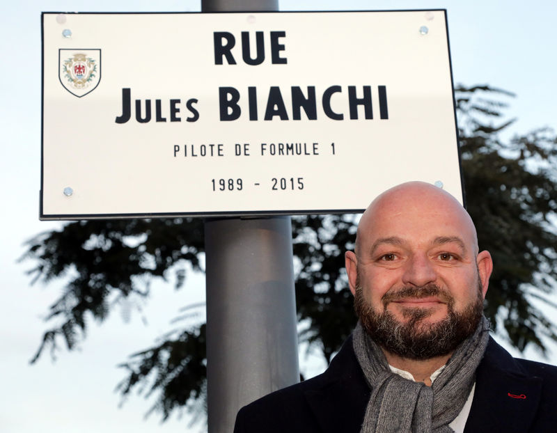 © Reuters. Philippe Bianchi, the father of Jules Bianchi Formula One driver who died on July 17, 2015 after an accident during the Japanese Grand Prix Formula 1 race, poses near the street plaque with his son's name during its inauguration in Nice