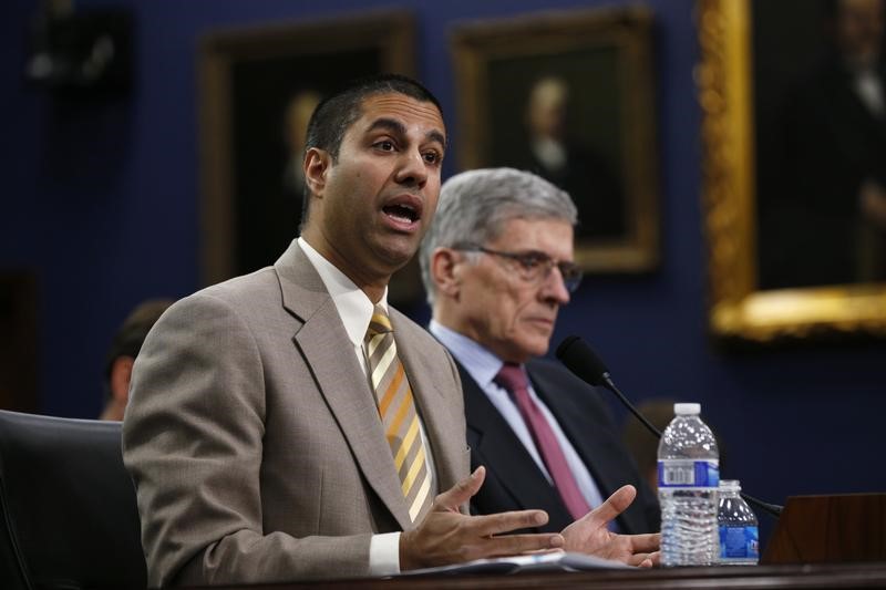 © Reuters. FCC Commissioner Pai and Chairman Wheeler testify at House Appropriations Subcommittee hearing on the FCC's FY2016 budget