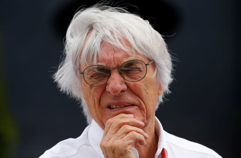 © Reuters. FILE PHOTO - Formula One supremo Ecclestone looks on before the Hungarian F1 Grand Prix at the Hungaroring circuit, near Budapest