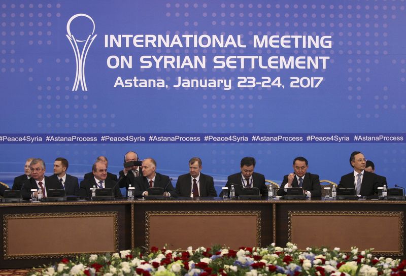 © Reuters. Rusia, Turquía e Irán deliberan sobre un alto el fuego en Siria