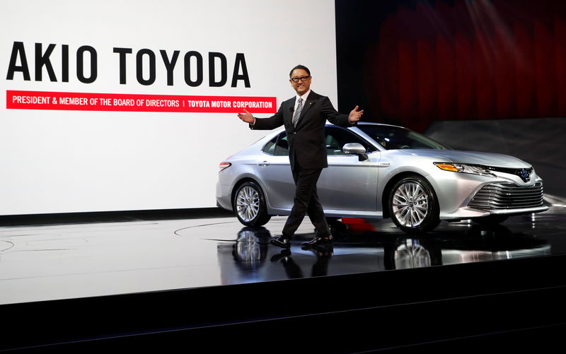 © Reuters. FILE PHOTO - Akio Toyoda, president of Toyota Motor Corporation, introduces the 2018 Camry XLE during the North American International Auto Show in Detroit