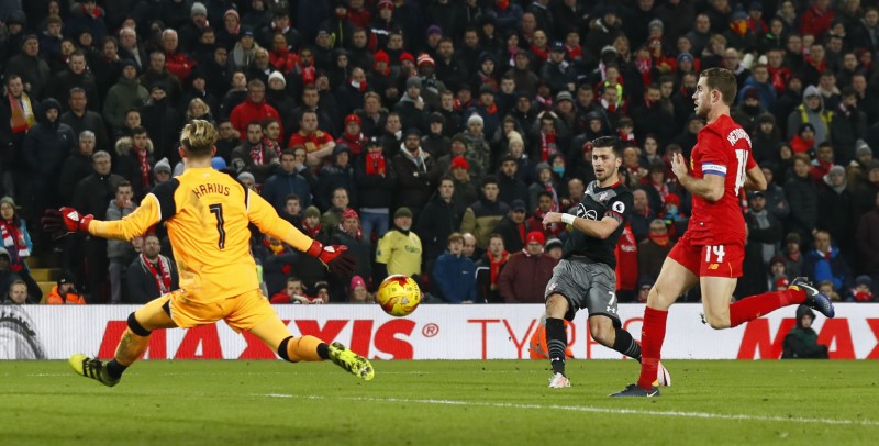 © Reuters. Southampton's Shane Long scores their first goal