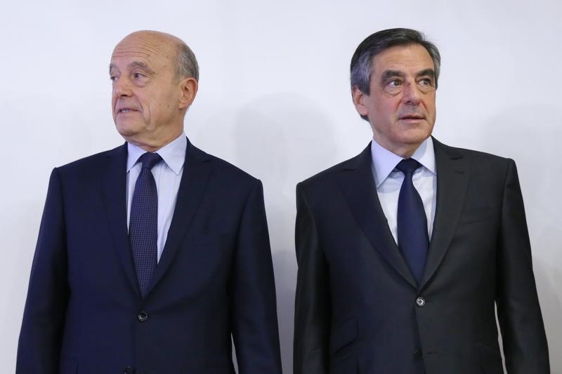 © Reuters. JUPPÉ EXCLUT D'ÊTRE UN RECOURS EN CAS DE RETRAIT DE FILLON