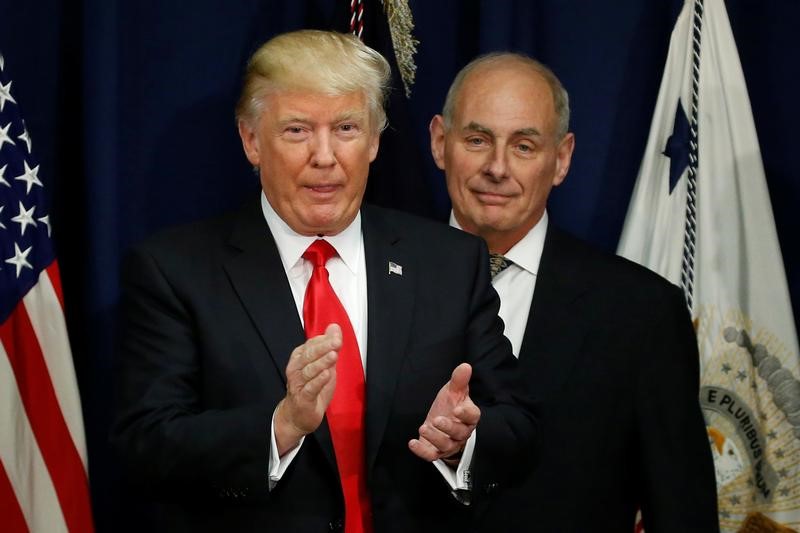 © Reuters. U.S. President Trump applauds after a ceremonial swearing-in for U.S. Homeland Security Secretary Kelly at Homeland Security headquarters in Washington