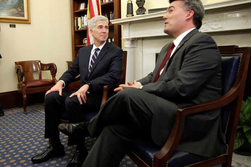 © Reuters. Supreme Court Nominee Judge Neil Gorsuch meets with Senator Cory Gardner (R-CO) on Capitol Hill in Washington.