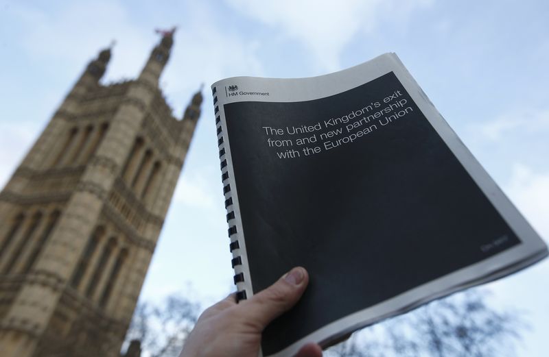 © Reuters. An illustration shows the white paper setting out Britain's government statergy for departing the European Union, outside Parliament, in London