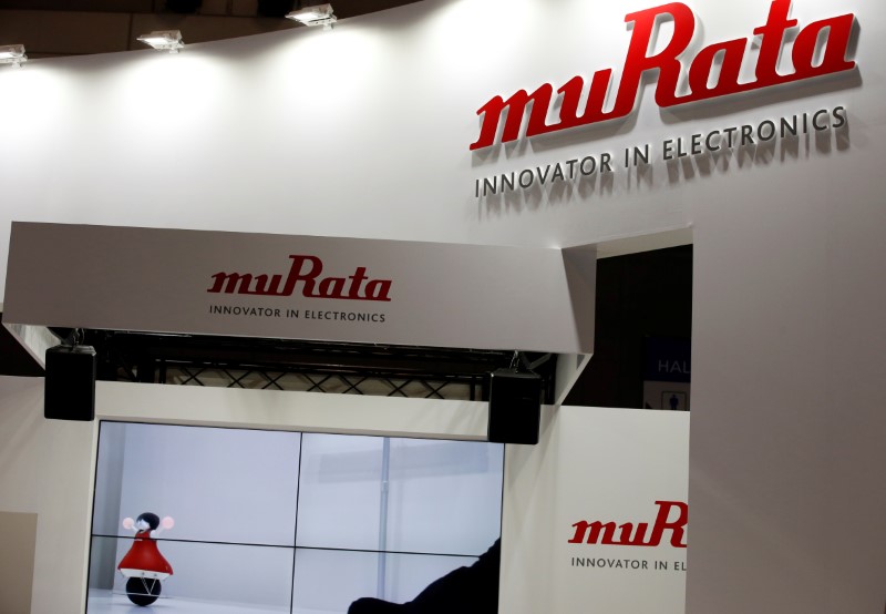 © Reuters. Logos of Murata Manufacturing Co are pictured at CEATEC JAPAN 2016 in Chiba