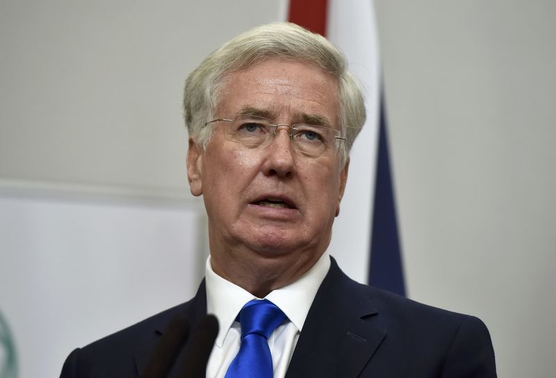 © Reuters. FILE PHOTO - Britain's Defence Secretary Michael Fallon attends a press conference with U.S. Secretary of Defence Ash Carter at the Foreign Office in London