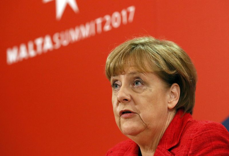 © Reuters. German Chancellor Angela Merkel visits a vantage point overlooking Valletta during a break in the European Union leaders summit in Malta