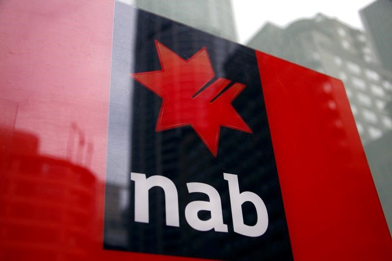 © Reuters. National Australia Bank logo is pictured on an automated teller machine in central Sydney