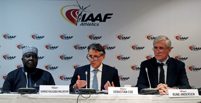 © Reuters. Sebastian Coe, IAAF's President, Rune Andersen, head of the IAAF taskforce on Russia and Hamad Kalkaba Malboum attend a press conference as part of the International Association of Athletics Federations (IAAF) council meeting in Monaco