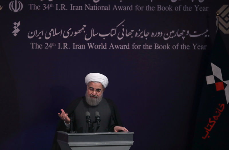 © Reuters. Iran's President Hassan Rouhani gestures as he speaks during the 34th Book of the Year Award ceremony, in Tehran