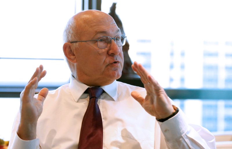 © Reuters. French Finance Minister Michel Sapin speaks during an interview with Reuters in his office at the Bercy Ministry in Paris