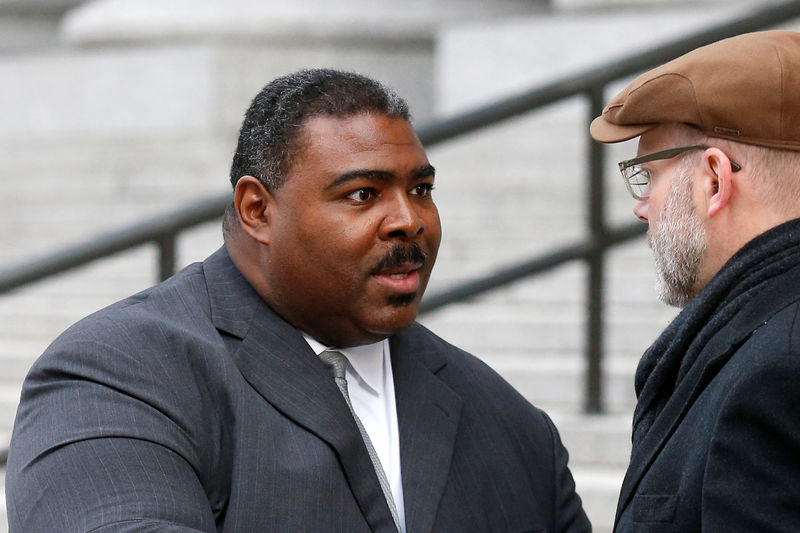 © Reuters. FILE PHOTO - Pastor Trevon Gross leaves the Manhattan Federal Courthouse in New York