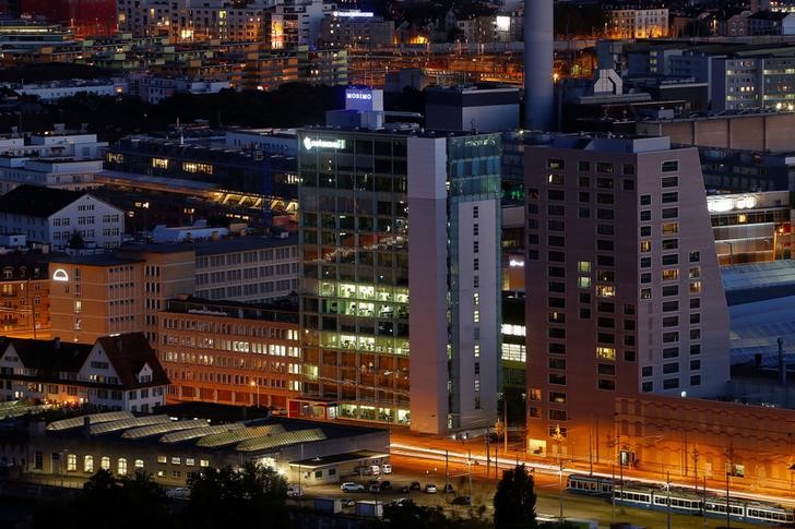 © Reuters. A long-time exposure shows an office building of Switzerland's Swisscom telecommunications  in Zurich