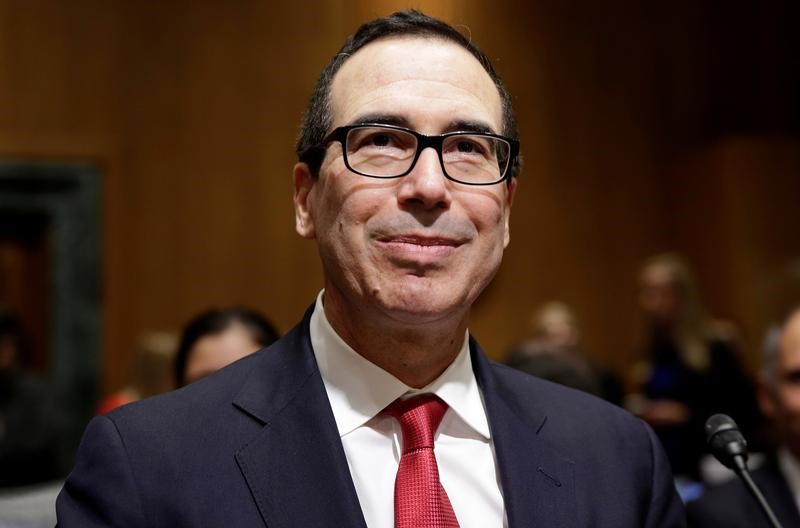 © Reuters. FILE PHOTO: Steven Mnuchin waits to testify before a Senate Finance Committee confirmation hearing on his nomination to be Treasury secretary in Washington